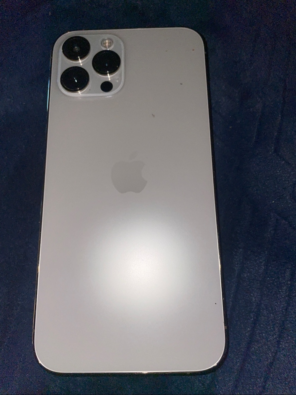 Apple Silver iPhone Pro Back with Triple-Lens Camera but it does not turn on